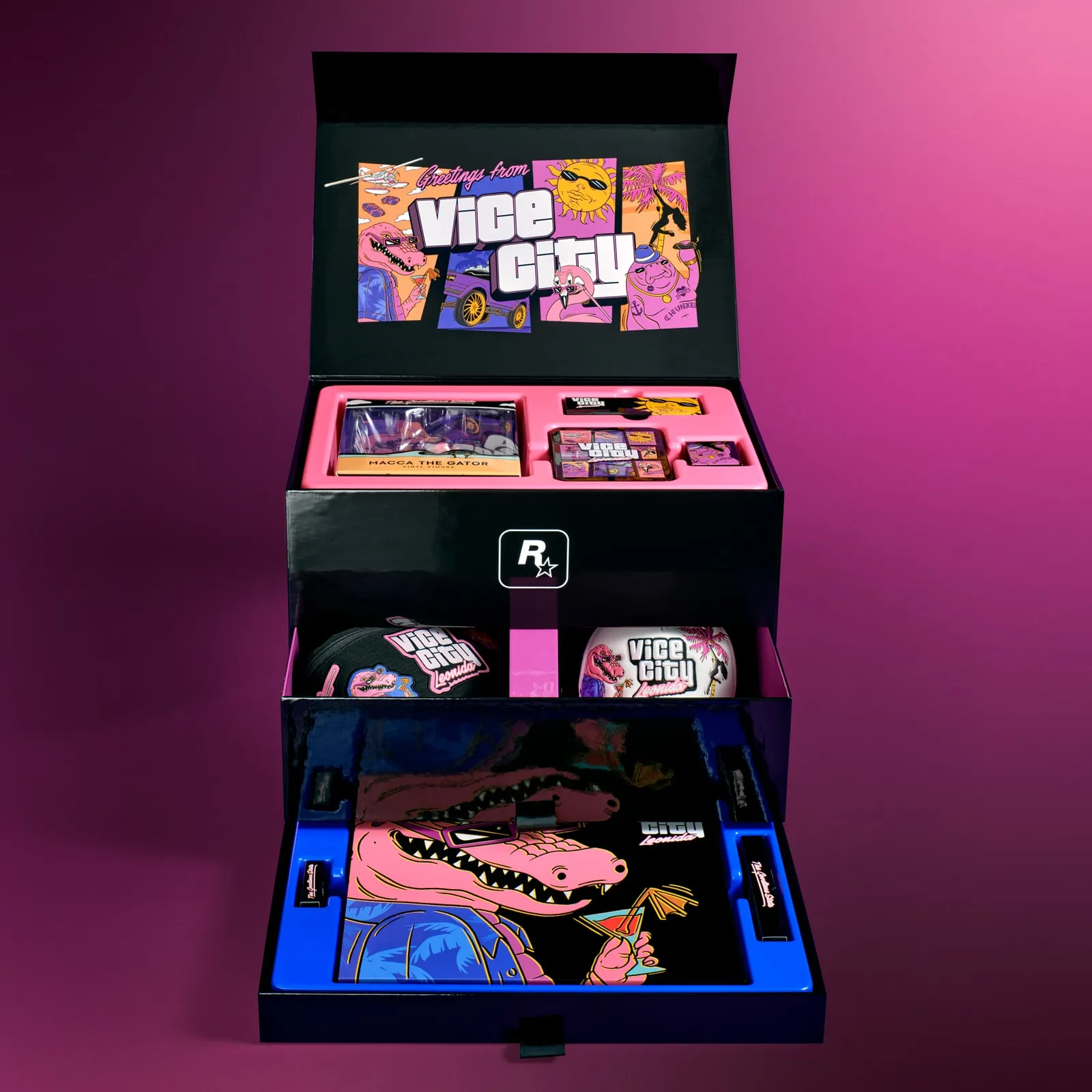 The collection's black box opened out on three levels, with the figure, sunglasses, cap, mirror and the other items each in its own slot