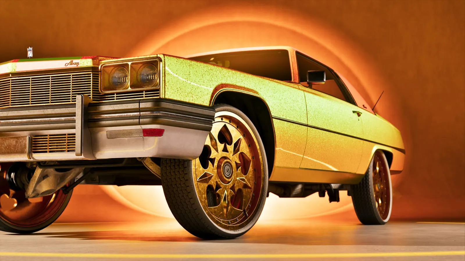 A gold two-door car raised high on gold rims, inside a workshop lit in orange