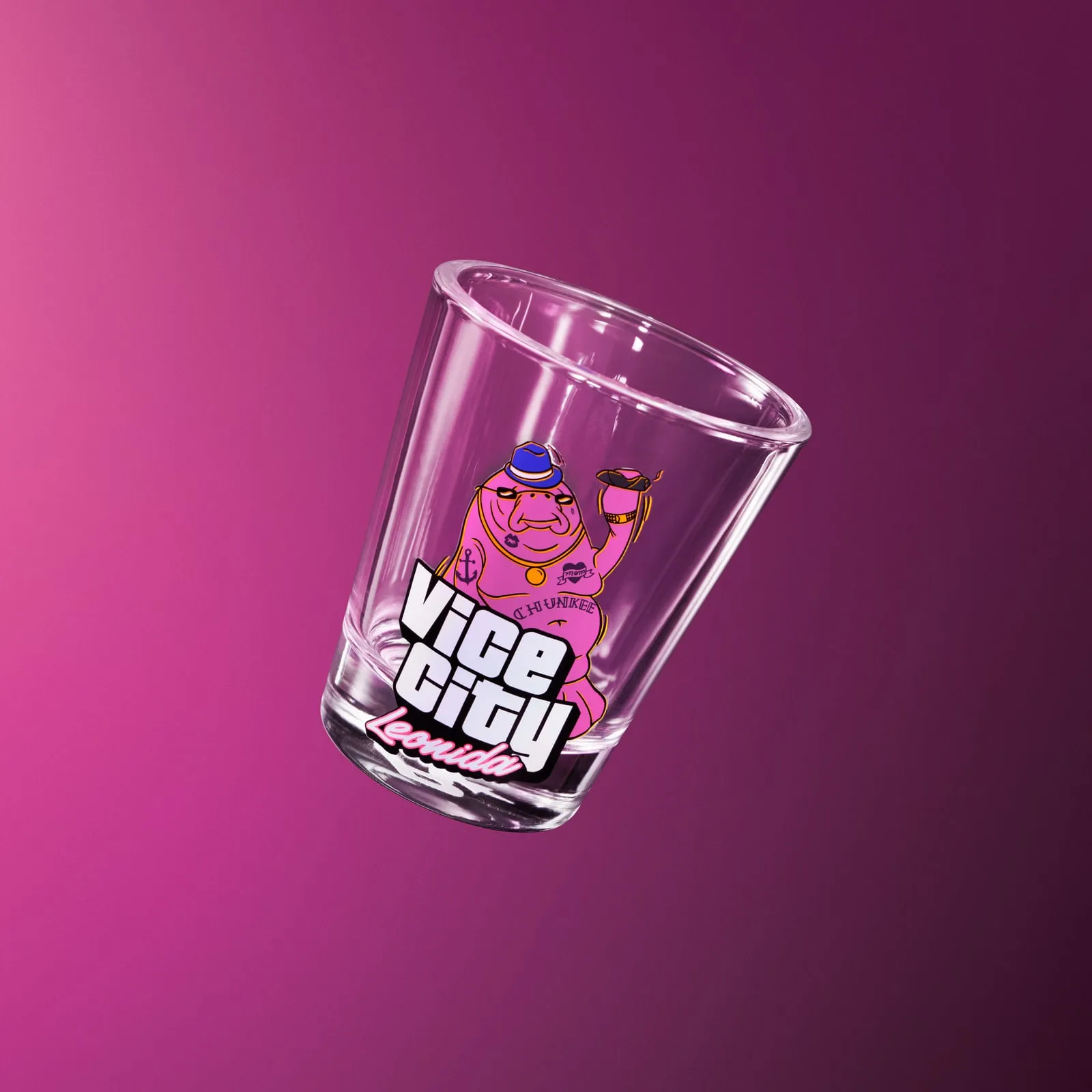 Glass shot glass printed with Chunkee the manatee and the Vice City lettering